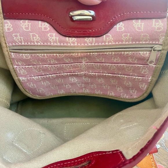 Dooney & Bourke Pink and Red Shoulder Bag
Size 10”L x 10”W x 5.5 - Picture 11 of 11